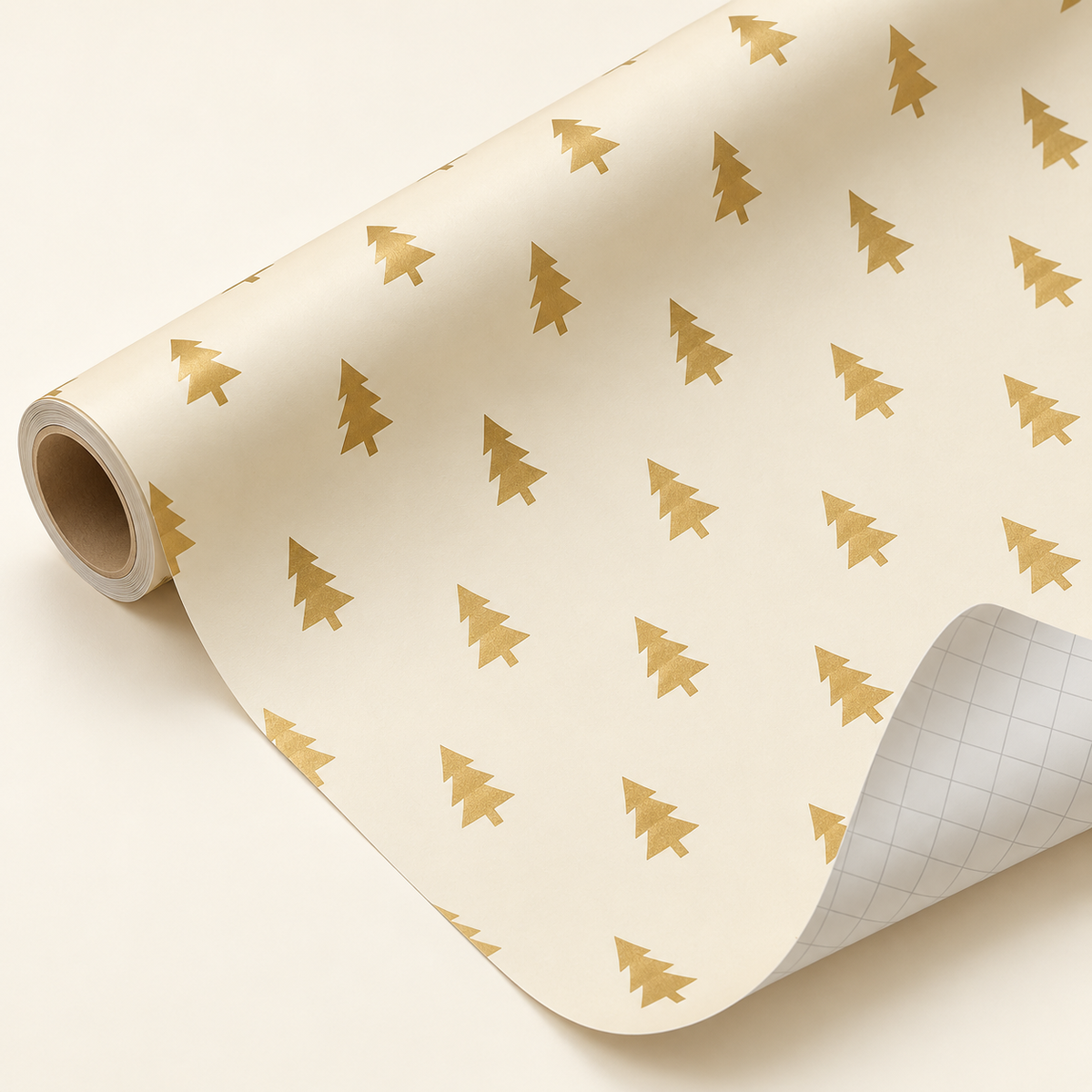 Maison Velere Golden Trees wrapping paper roll in ivory with metallic gold Christmas trees, showing light gray cutting grid lines on the back