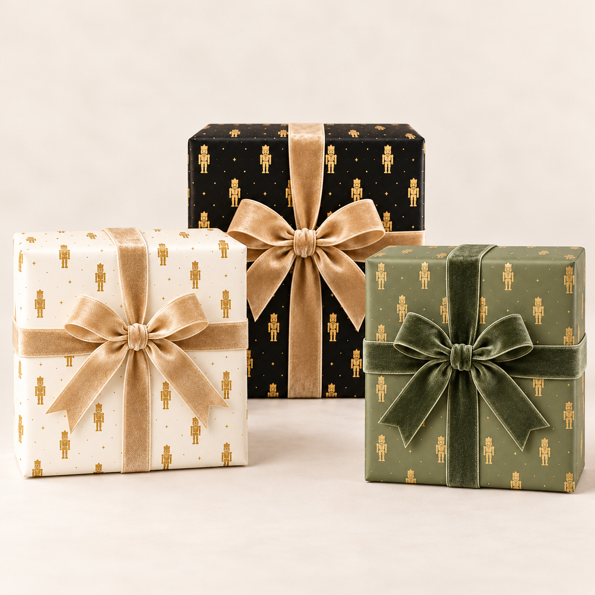Maison Velere Nutcracker wrapping paper in three colors: ivory and gold, midnight and gold, and sage and gold